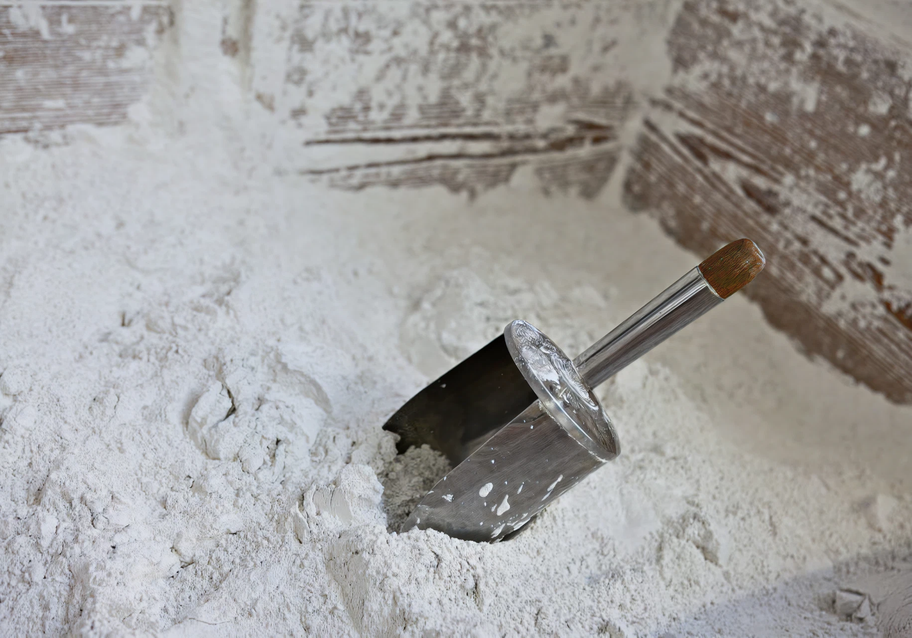 Royal Delft white clay being scooped