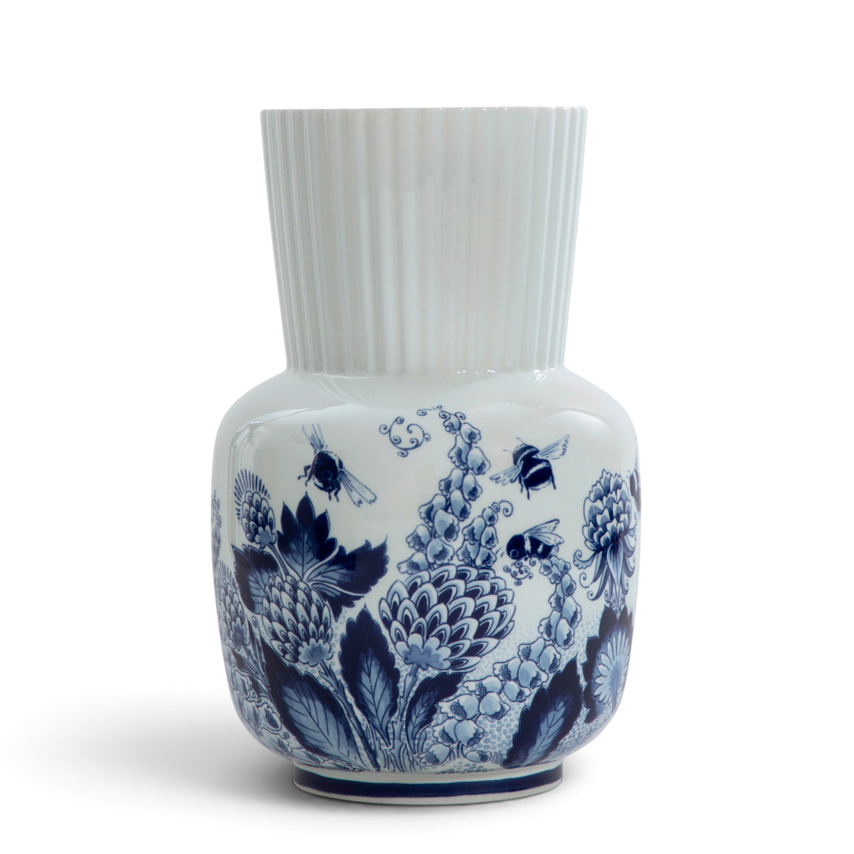 Royal Delft Giulia vase featuring blue and white floral patterns with bees on a ribbed porcelain body